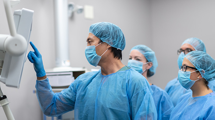 interventional radiology teanm reviewing scan
