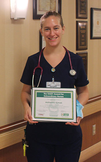 Adrienne Kimak, BSN, RN with her Daisy Award