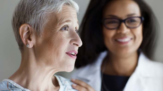 older woman and doctor