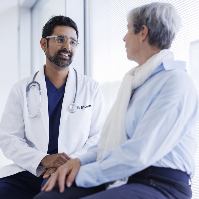 doctor talking with patient