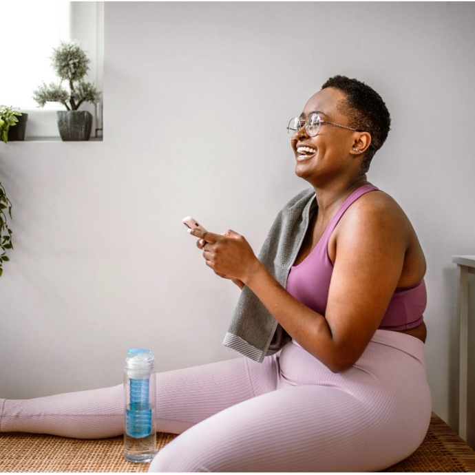 Woman in yoga pants smiling